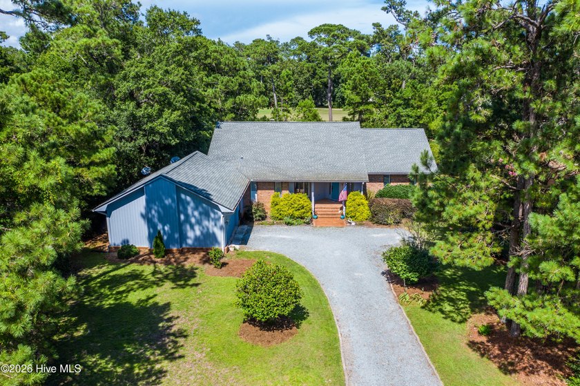 Welcome to this enchanted cottage nestled on over a half-acre - Beach Home for sale in Hampstead, North Carolina on Beachhouse.com