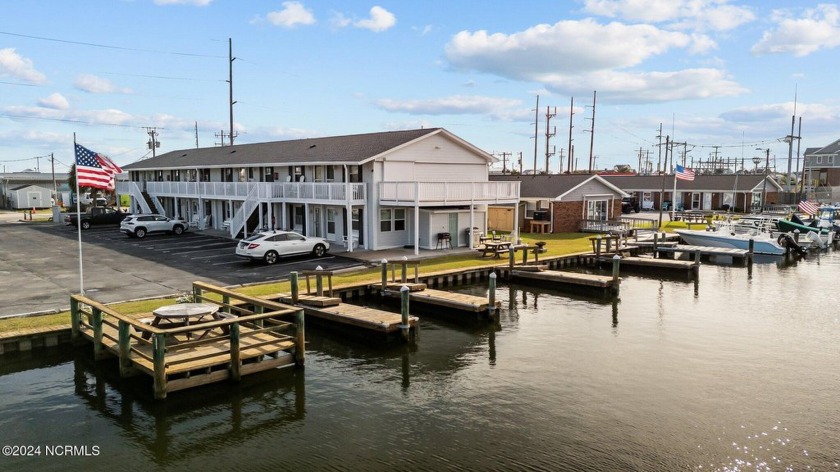 Nestled along the waterfront, this one-bedroom canal front condo - Beach Condo for sale in Atlantic Beach, North Carolina on Beachhouse.com