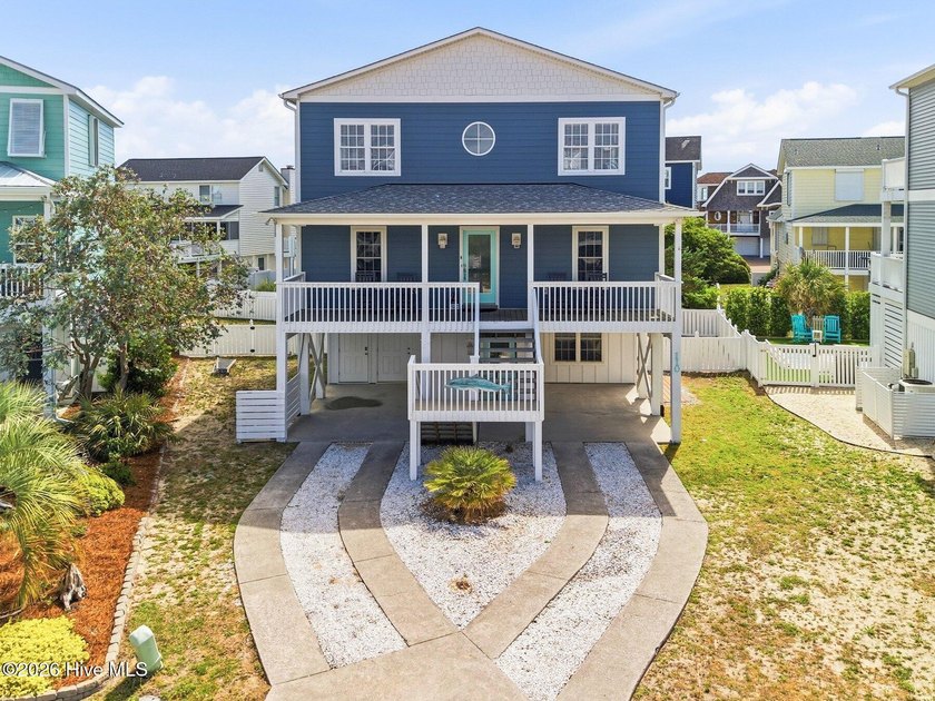 Tucked just one street back from the ocean in the coveted Kure - Beach Home for sale in Kure Beach, North Carolina on Beachhouse.com