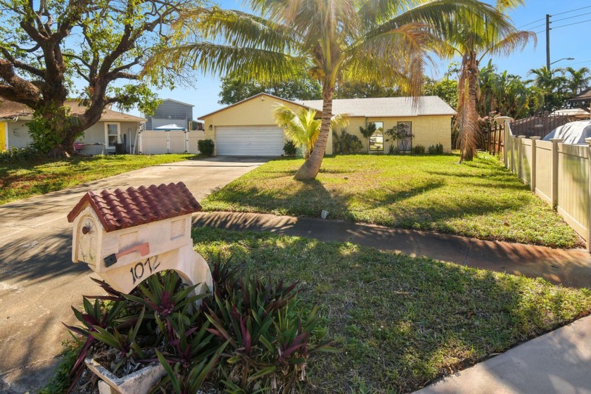 Discover this beautifully updated 3-bedroom, 2-bath home with a - Beach Home for sale in West Palm Beach, Florida on Beachhouse.com