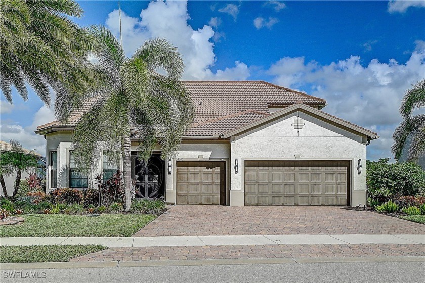 PICTURE PERFECT LAKEFRONT PROPERTY WITH GORGEOUS SUNSET VIEWS IN - Beach Home for sale in Estero, Florida on Beachhouse.com