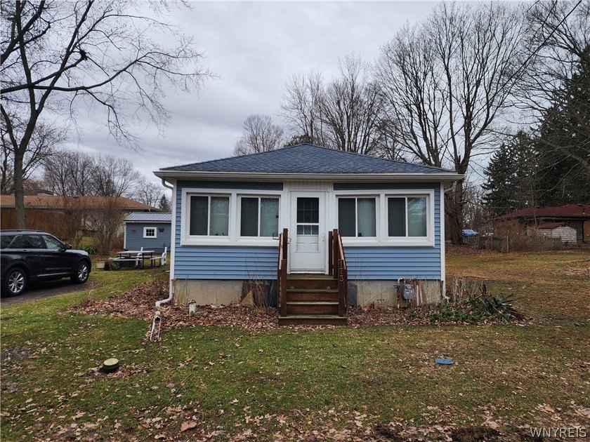 Point Breeze cottage ready for a new owner. Needs some work but - Beach Home for sale in Angola, New York on Beachhouse.com