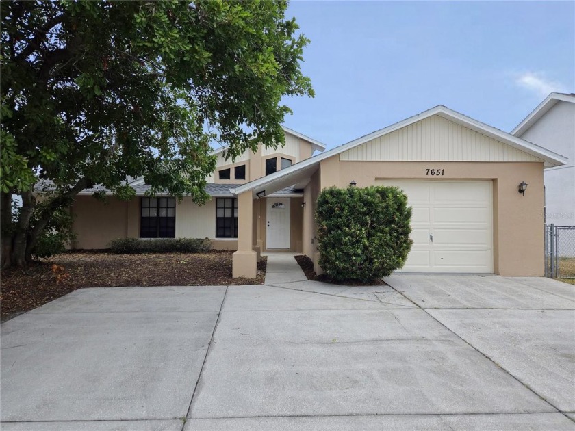 Beautiful Lakefront home with dock. This home is in move-in - Beach Home for sale in Port Richey, Florida on Beachhouse.com