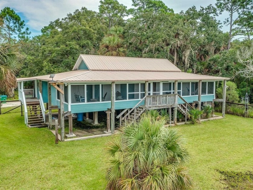 Welcome to this old Florida coastal cottage sitting in one of - Beach Home for sale in Crawfordville, Florida on Beachhouse.com