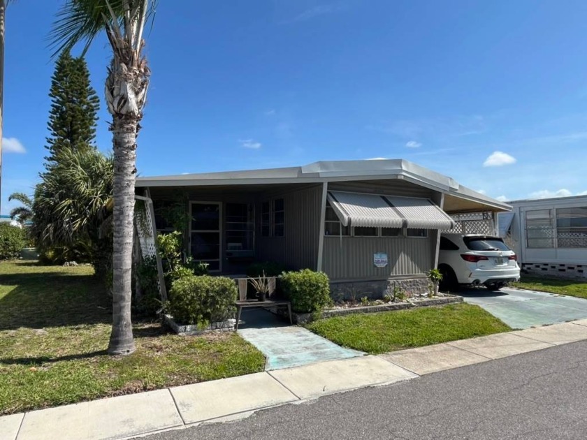 This AFFORDABLE home is in a beautiful, safe, well appointed - Beach Home for sale in Dunedin, Florida on Beachhouse.com