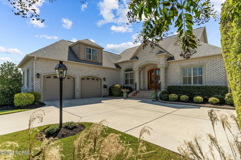 This home boasts captivating sunset views over the 3rd hole of - Beach Home for sale in Leland, North Carolina on Beachhouse.com