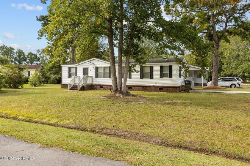 Affordable with a great corner lot location in The Village At - Beach Home for sale in Carolina Shores, North Carolina on Beachhouse.com