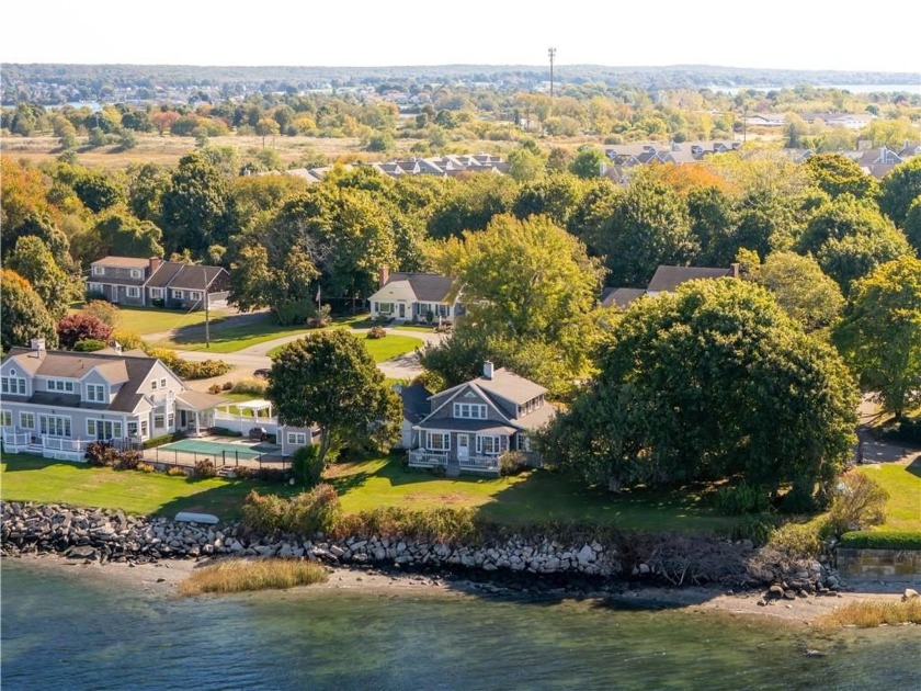 Welcome to your dream waterfront escape! This classic 1925 - Beach Home for sale in Portsmouth, Rhode Island on Beachhouse.com