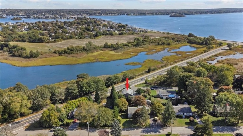 Welcome Home! This beautifully sun-filled home offers an open - Beach Home for sale in Portsmouth, Rhode Island on Beachhouse.com