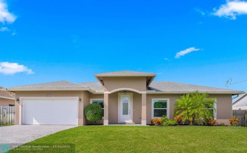 Welcome to this spacious, turnkey 3-bedroom, 2-bathroom modern - Beach Home for sale in Lake Worth, Florida on Beachhouse.com