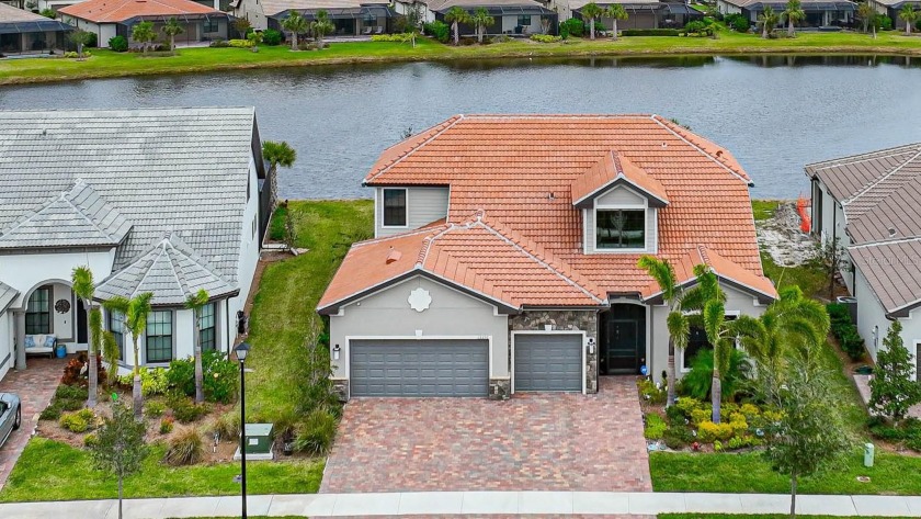 This stately executive home is located in Islandwalk At West - Beach Home for sale in Venice, Florida on Beachhouse.com