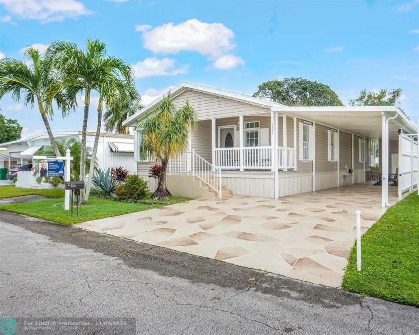 Discover your dream home in this beautifully renovated 3 bedroom - Beach Home for sale in Davie, Florida on Beachhouse.com