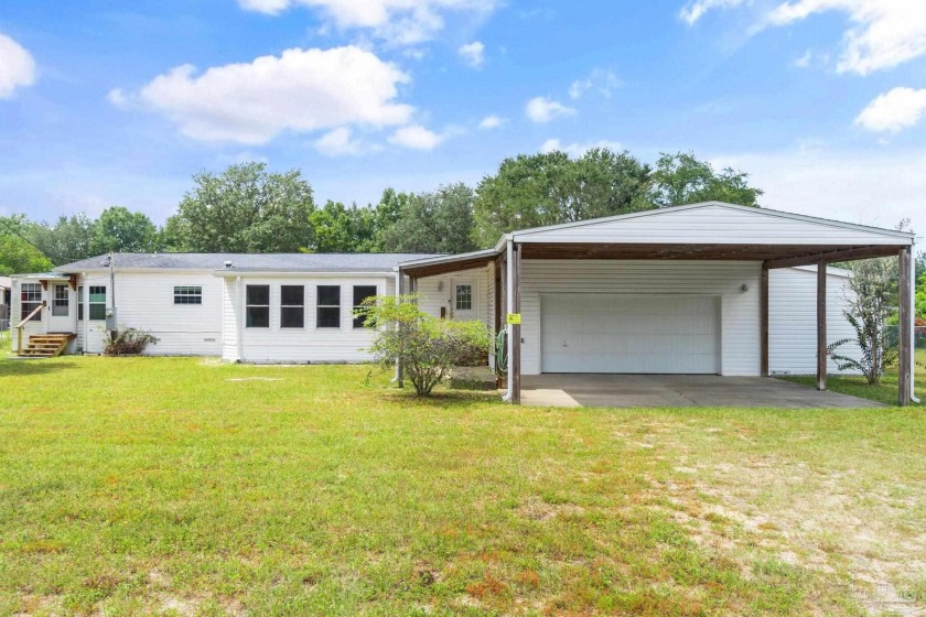 Discover this highly versatile property offering space, privacy - Beach Home for sale in Milton, Florida on Beachhouse.com