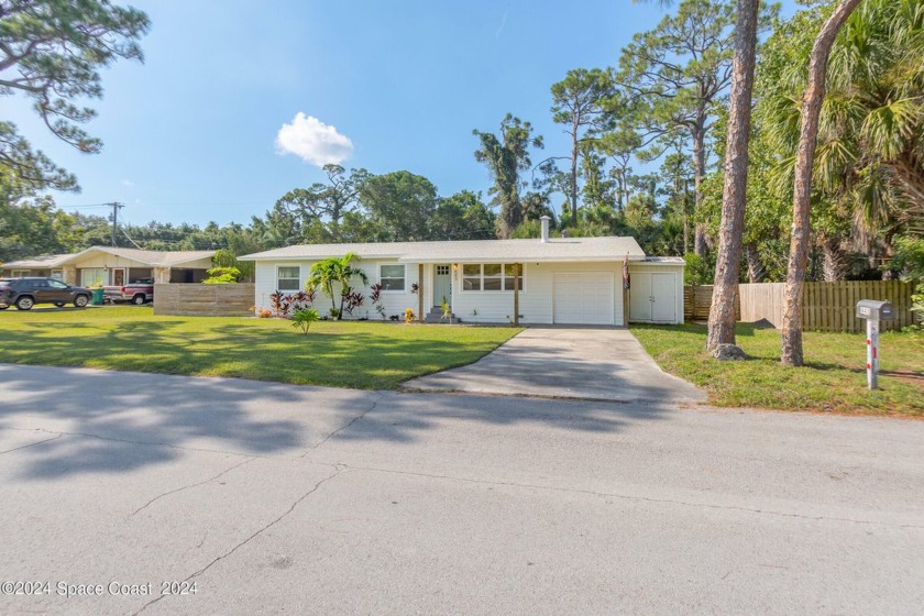 Welcome to this beautifully remodeled mid-century concrete block - Beach Home for sale in Merritt Island, Florida on Beachhouse.com