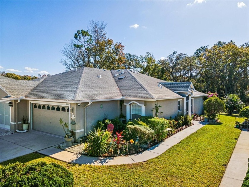 Welcome home!! Popular 55+ Villa with fantastic views of the - Beach Home for sale in New Port Richey, Florida on Beachhouse.com