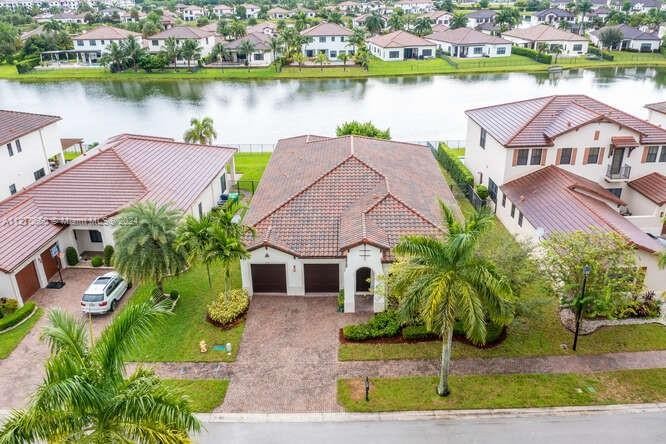 *Brisbane* lake front model on one of the most desirable Cooper - Beach Home for sale in Cooper  City, Florida on Beachhouse.com