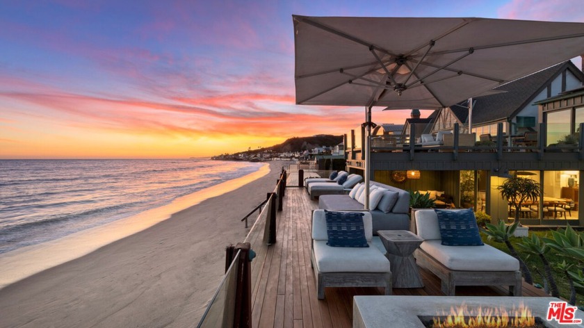 One of Southern California's most desirable addresses, this Cape - Beach Home for sale in Malibu, California on Beachhouse.com