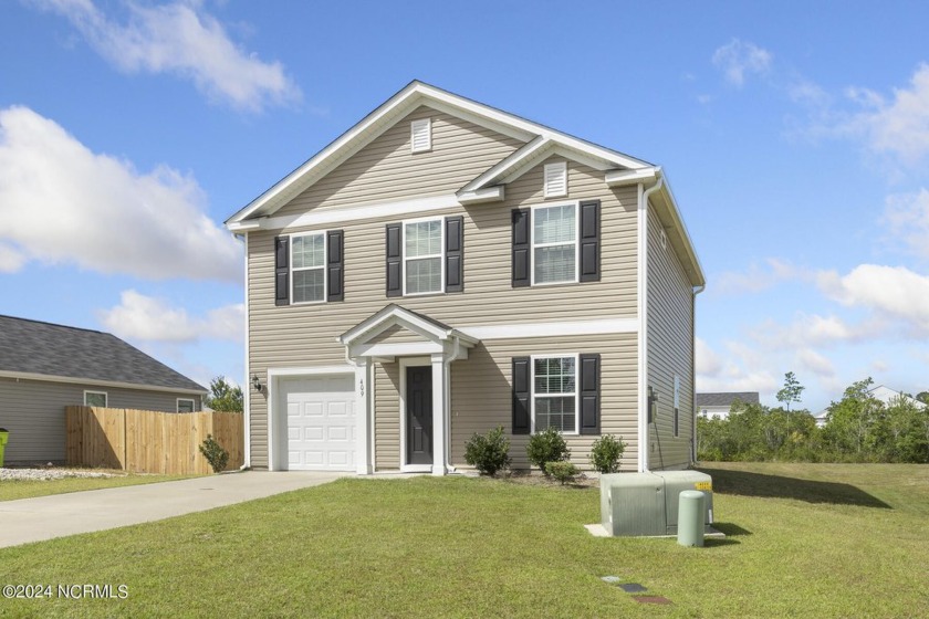 Coastal Charm!! This beauty offers over 1500 sqft of pure - Beach Home for sale in Holly Ridge, North Carolina on Beachhouse.com