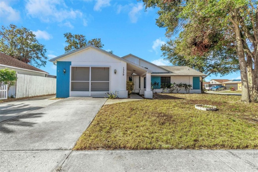 3/2/1 (OVERSIZED GARAGE) SPACIOUS HOME WITH A  GREAT CURB APPEAL - Beach Home for sale in Holiday, Florida on Beachhouse.com