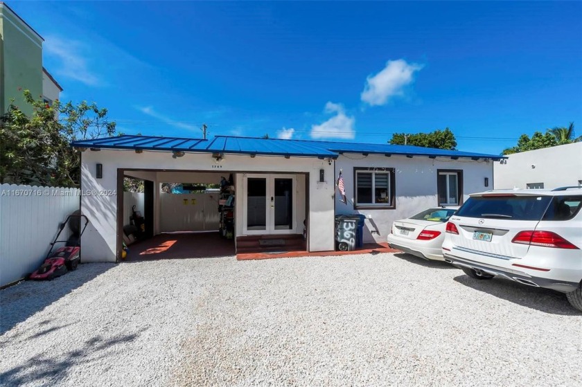 This stunning single family home comes with a bonus fully - Beach Home for sale in Miami Beach, Florida on Beachhouse.com