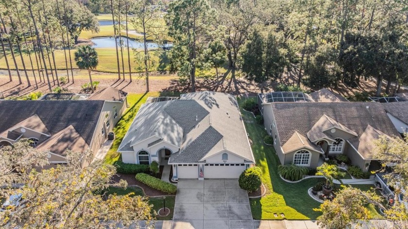 GORGEOUS 4 BEDROOM HOME W/ 3 CAR GARAGE ON GOLF COURSE IN HIGHLY - Beach Home for sale in New Port Richey, Florida on Beachhouse.com