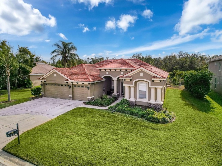 ABSOLUTELY STUNNING! This exquisite 4-bedroom, 3-bath home - Beach Home for sale in New Port Richey, Florida on Beachhouse.com