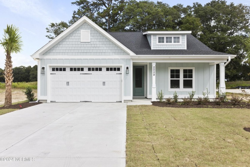 Welcome to beach life in this adorable, easy to live in home - Beach Home for sale in Ocean Isle Beach, North Carolina on Beachhouse.com