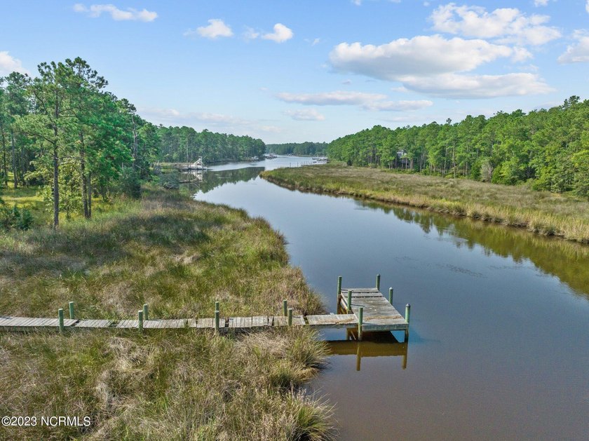 Welcome home to a splendid waterfront homesite with an EXISTING - Beach Acreage for sale in Merritt, North Carolina on Beachhouse.com