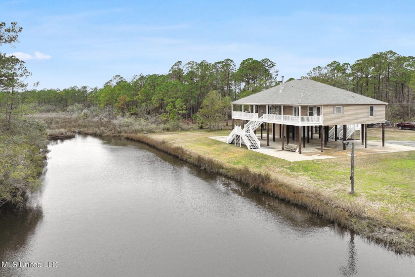 Your waterfront retreat is waiting for you. A true Fisherman and - Beach Home for sale in Pass Christian, Mississippi on Beachhouse.com