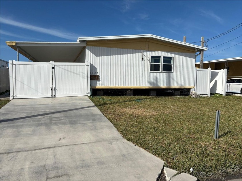 Nestled along the serene waterside, this charming 3-bedroom - Beach Home for sale in Hudson, Florida on Beachhouse.com