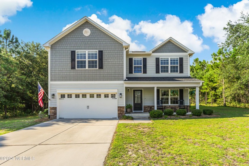 Say hello to the ideal coastal farmhouse designed for - Beach Home for sale in Shallotte, North Carolina on Beachhouse.com