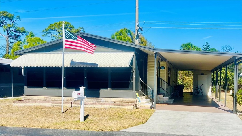 This charming, two-bedroom, two-bathroom manufactured home in - Beach Home for sale in Sarasota, Florida on Beachhouse.com