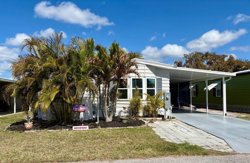 This is a MUST SEE Waterfront Home  It's move-in season in Bay - Beach Home for sale in Venice, Florida on Beachhouse.com
