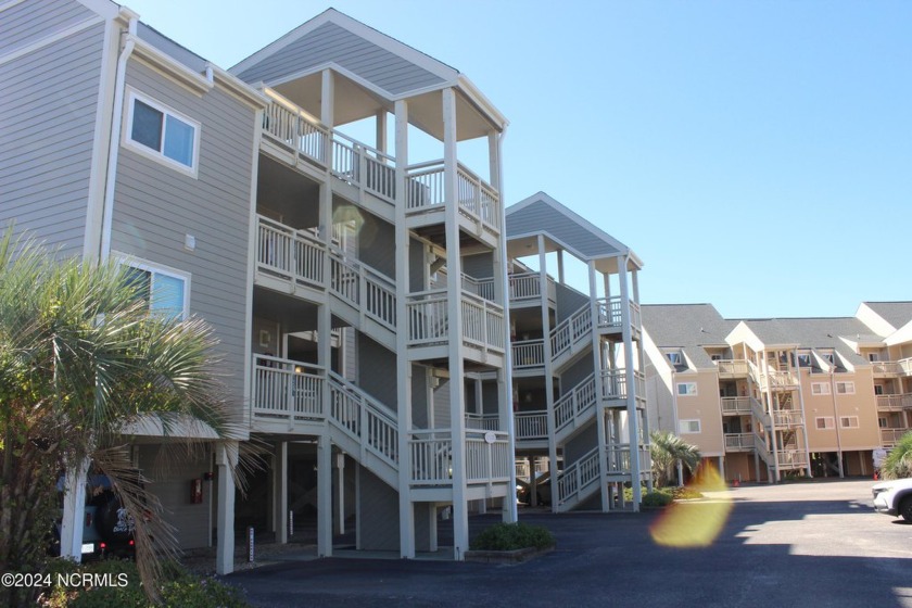 This immaculate, spacious 3-bedroom condo offers breathtaking - Beach Condo for sale in Oak Island, North Carolina on Beachhouse.com