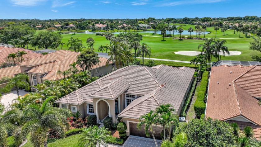 Nestled on a picturesque street within a coveted golf course - Beach Home for sale in West Palm Beach, Florida on Beachhouse.com