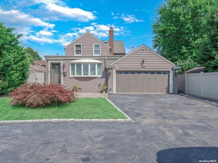 Welcome to this stunning contemporary Cape Cod home, perfectly - Beach Home for sale in Copiague, New York on Beachhouse.com