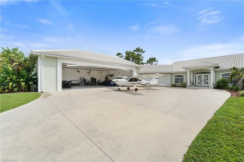 Welcome to the ultimate dream home in Pine Shadow Air Park- 94FL - Beach Home for sale in North Fort Myers, Florida on Beachhouse.com