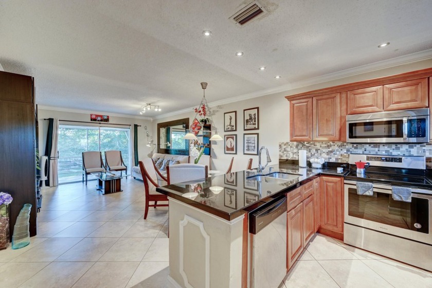 Spacious 2-Bedroom, 2-Bathroom Condo with Stunning Lake Views - - Beach Condo for sale in Lauderdale Lakes, Florida on Beachhouse.com