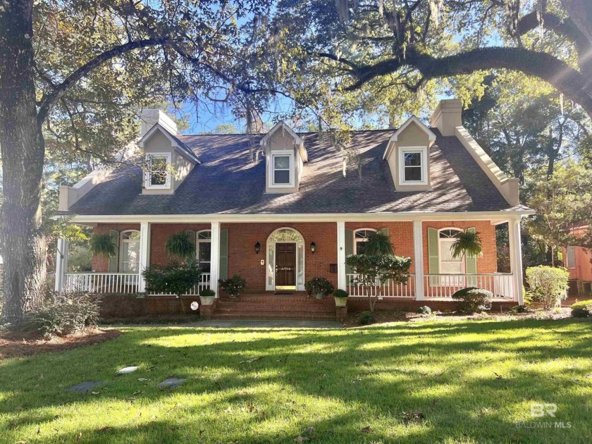 Gorgeous custom home with magnificent oak trees framing this - Beach Home for sale in Daphne, Alabama on Beachhouse.com