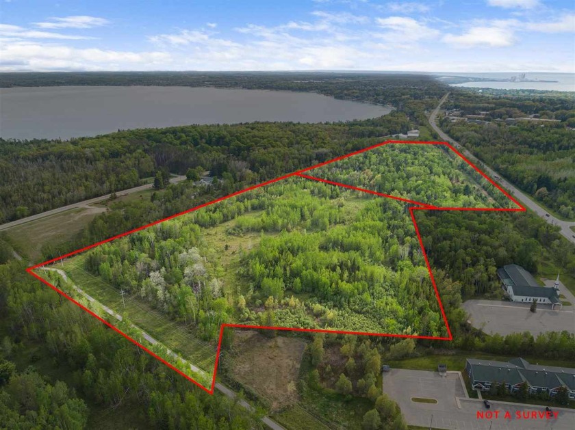 50+ acres of site ready commercial development acreage along one - Beach Lot for sale in Charlevoix, Michigan on Beachhouse.com