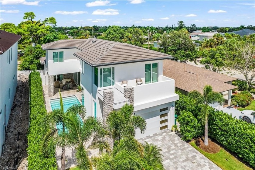 This Modern Beauty is just steps from the beach, located on the - Beach Home for sale in Naples, Florida on Beachhouse.com