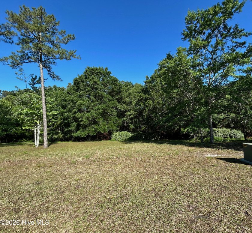 Discover a beautifully private homesite nestled in a serene - Beach Lot for sale in Shallotte, North Carolina on Beachhouse.com