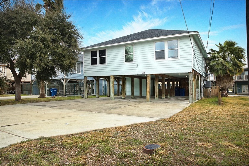 Beautifully positioned on the water along Laguna Shores, this - Beach Home for sale in Corpus Christi, Texas on Beachhouse.com