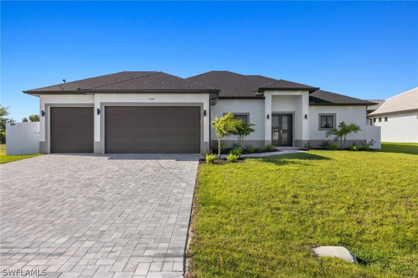 Stunning new construction Florence 3 car garage model in - Beach Home for sale in Cape Coral, Florida on Beachhouse.com