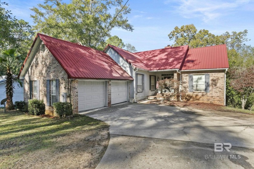 This beautifully updated home, with potential for four bedrooms - Beach Home for sale in Daphne, Alabama on Beachhouse.com