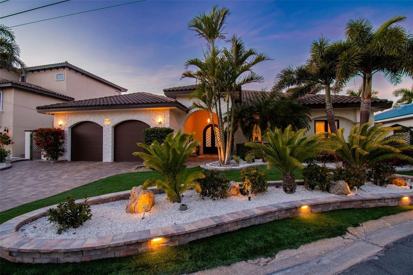 Discover your own slice of paradise at this exquisite waterfront - Beach Home for sale in ST Pete Beach, Florida on Beachhouse.com