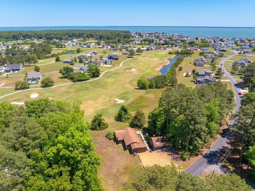 Enjoy golf course living in the amenity-rich community of - Beach Home for sale in Greenbackville, Virginia on Beachhouse.com