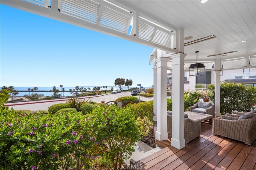 Located on an exceptional corner lot overlooking the harbor - Beach Home for sale in Corona Del Mar, California on Beachhouse.com