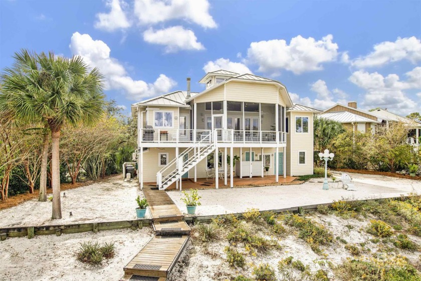 Situated on a peaceful, idyllic cul-de-sac, this spacious and - Beach Home for sale in Orange Beach, Alabama on Beachhouse.com