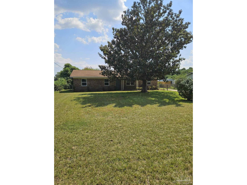 Move-In Ready Home on a Spacious  3/4  Acre Lot - USDA Eligible! - Beach Home for sale in Pensacola, Florida on Beachhouse.com